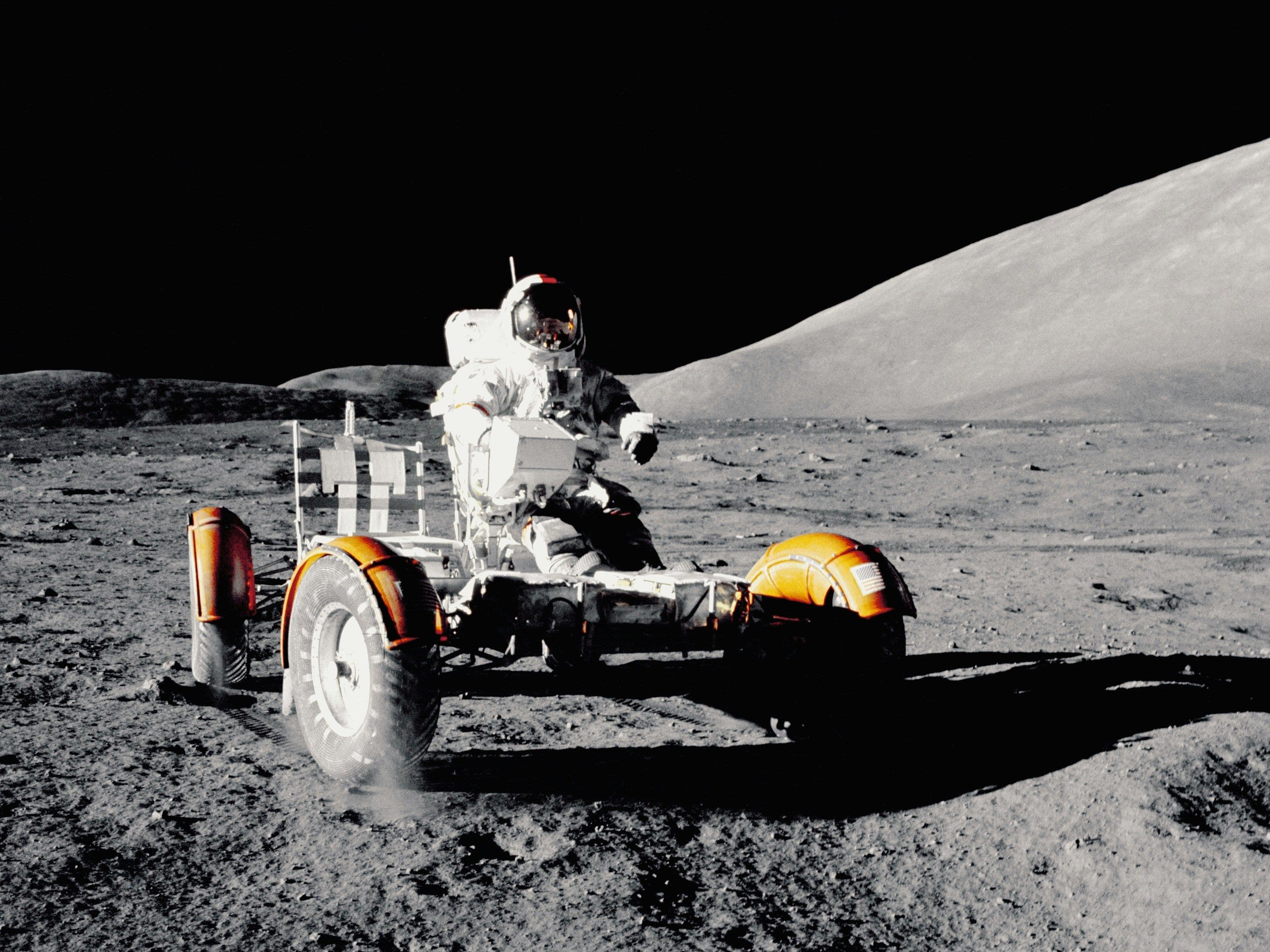 Astronaut driving on moon